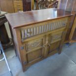 A small carved oak sideboard