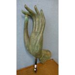 A Chinese cast bronze hand sculpture