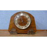 An Art Deco walnut mantel clock