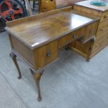 A walnut dressing desk