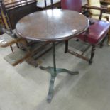 A wrought steel based pub table