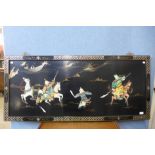 A Chinese black lacquered chinoiserie wall hanging plaque