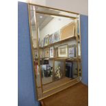 A gilt framed mirror