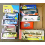 Ten die-cast model coaches and buses, boxed