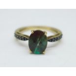 A 9ct gold ring with faceted main stone and stone set shoulders, 2.4g, N