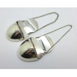 A pair of silver Asprey holders/pockets with chains, Birmingham 1926, 56g