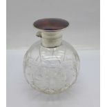 A silver mounted cut glass scent bottle, with inner stopper, mark worn
