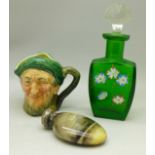 A silver topped scent bottle with Geisha girl, a Royal Doulton miniature Auld Mac jug and a green