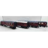 Four Hornby 00 gauge model railway carriages