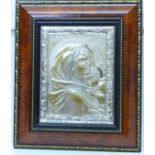 A framed and mounted embossed silver plaque depicting Madonna and Child, signed Romagnoli, width