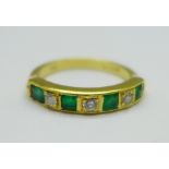 An 18ct gold, emerald and diamond ring, 4.1g, N