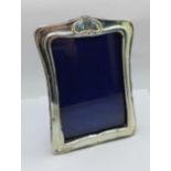 An Art Nouveau silver photograph frame, Birmingham 1902, height 16cm