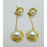 A pair of silver gilt and freshwater pearl drop earrings
