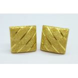 A pair of yellow metal earrings, the fasteners marked 750, 2.5g