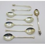 Five silver coffee spoons, a silver commemorative spoon and a pair of silver sugar bows, 63g