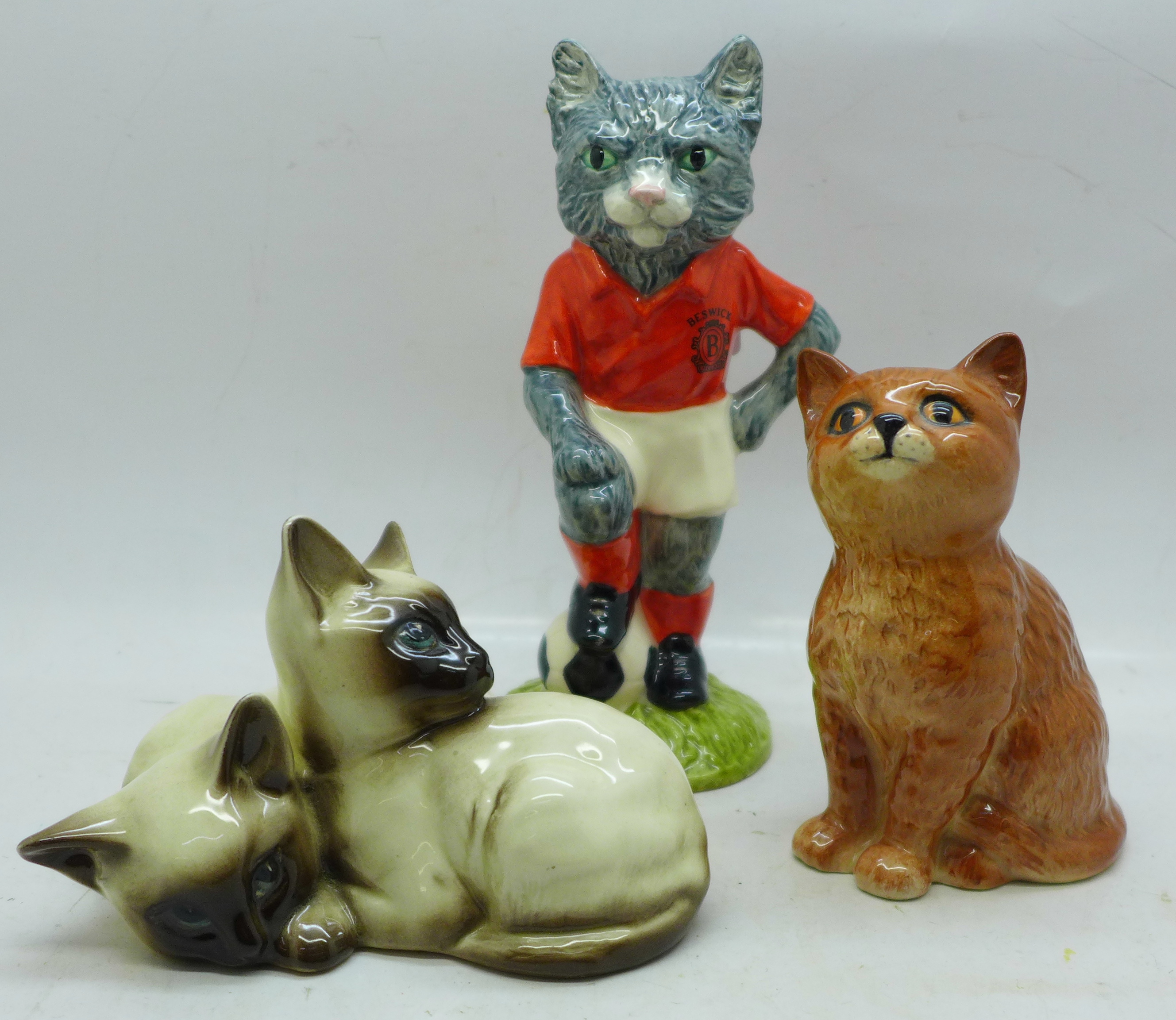 Three Beswick cat figures, The Footballing Felines Collection Kitkat, Siamese cats and Kittens