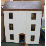 A wooden dolls house