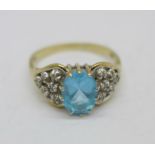 A 9ct gold, diamond and blue topaz ring, 3.8g, T