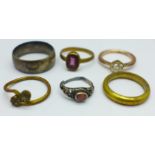 A late Victorian silver wedding ring, V, and five other rings, some a/f