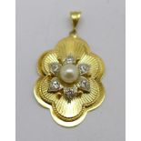 A 9ct gold, pearl and stone set pendant, 7.4g, 24mm wide