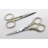 Two pairs of silver handled manicure scissors, one marked 925, one marked Sterling