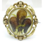 A Victorian swivel photograph brooch, width 39mm