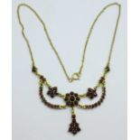 A 9ct gold and garnet necklace, 10g, 41cm