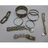 Four silver bracelets and five silver bangles, 107g
