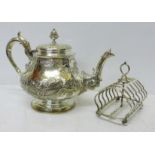 A silver plated teapot by Elkington & Co., and a plated toast rack