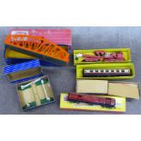 A Hornby Dublo Island Platform Kit, 5015 Girder Bridge, a D1 level crossing, two coaches and a crane