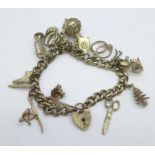 A silver charm bracelet, 56g