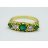 An 18ct gold, emerald and diamond ring, 4.2g, O