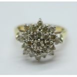 A 9ct gold, twenty-five stone diamond cluster ring, 4.9g, S