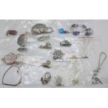 Silver necklets and silver and silver mounted pendants and chains, eighteen in total