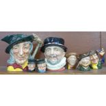 Two large Royal Doulton character mugs, Pied Piper, Beefeater and five smaller Royal Doulton