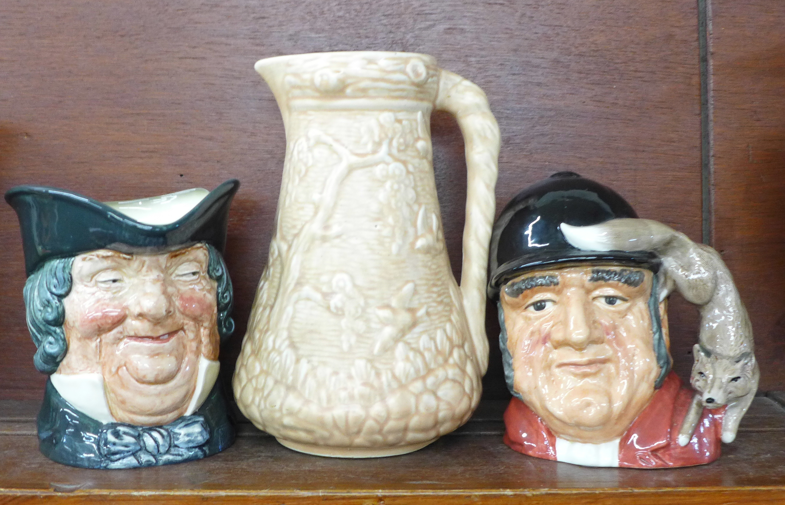 Two Royal Doulton large character jugs, Gone Away and Parson Brown, and a relief moulded Art Deco