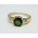 A 9ct gold, green stone and diamond ring, 2g, J