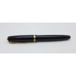 A Parker Duofold pen with 14k nib and pump action