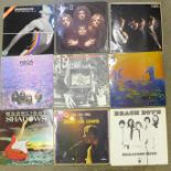 Twelve LP records including Queen, The Rolling Stones, Pink Floyd, 10CC, The Beach Boys, etc.