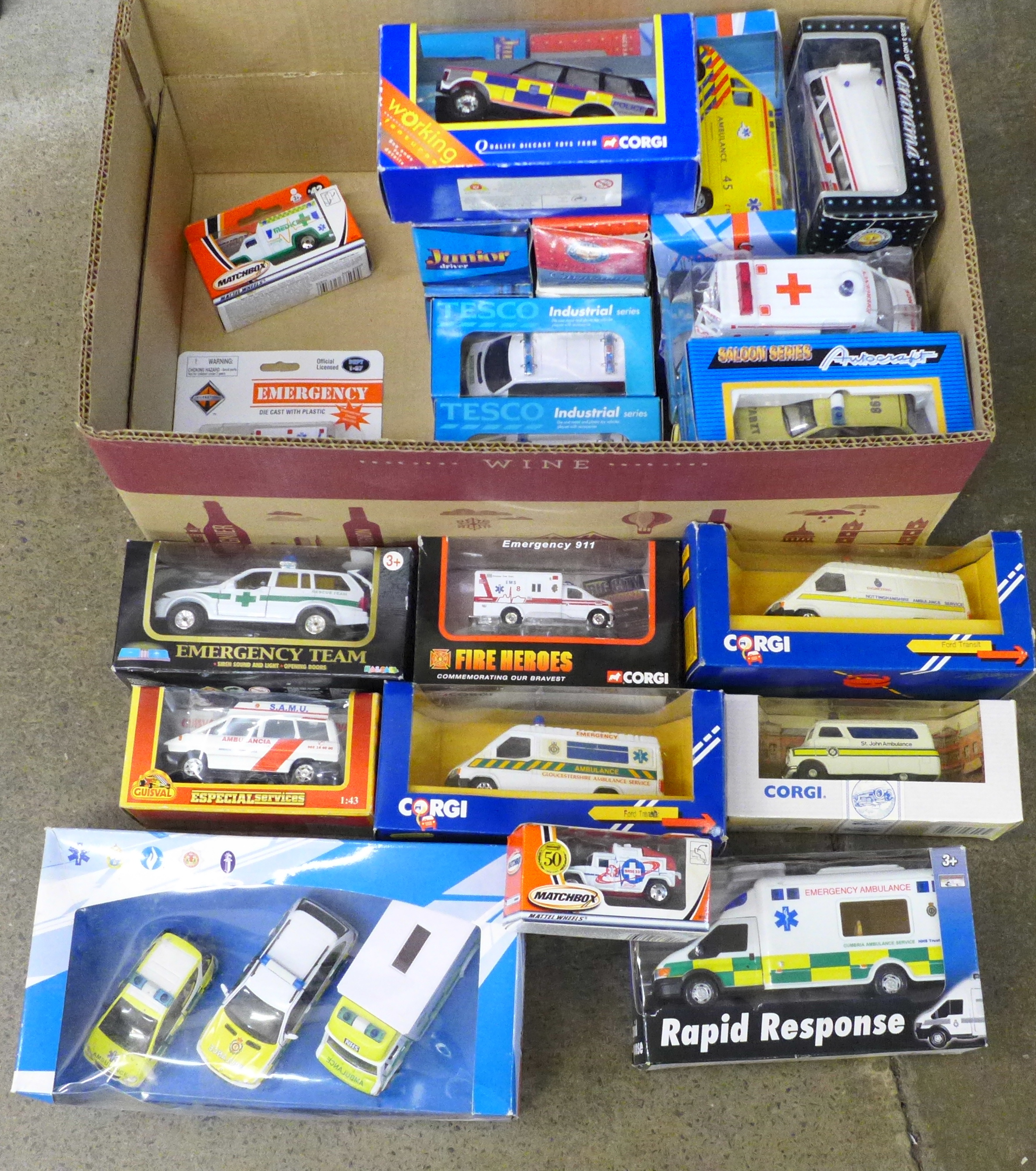 A collection of emergency service model vehicles including Corgi and Matchbox