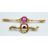 Two 9ct gold brooches; horseshoe with red stone and one set with a pink stone, total weight 3.1g