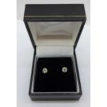 A pair of 18ct white gold, diamond stud earrings, 0.67ct total diamond weight