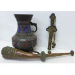 An oriental vase, a horn and a dagger made from Chinese coins