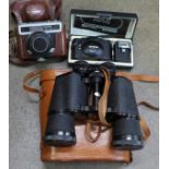 A pair of Greenkat 10x50 binoculars, a Werra camera and an Olympus XA2 camera and flash