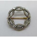 An early Victorian diamond set brooch, 22mm, (gold back and silver settings)