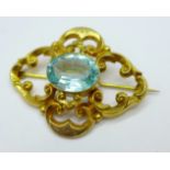 A Victorian brooch set with a blue stone, 39mm x 50mm