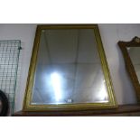 A gilt framed mirror