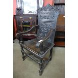 A 17th Century style carved oak Wainscot chair