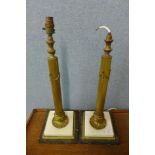 A pair of marble and gilt metal table lamps