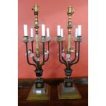 A pair of Italian style gilt metal, marble and floral encrusted table lamps